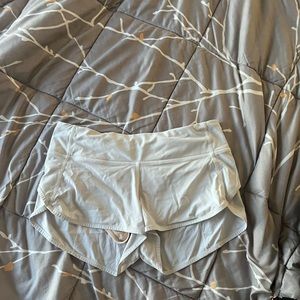 white lululemon shorts